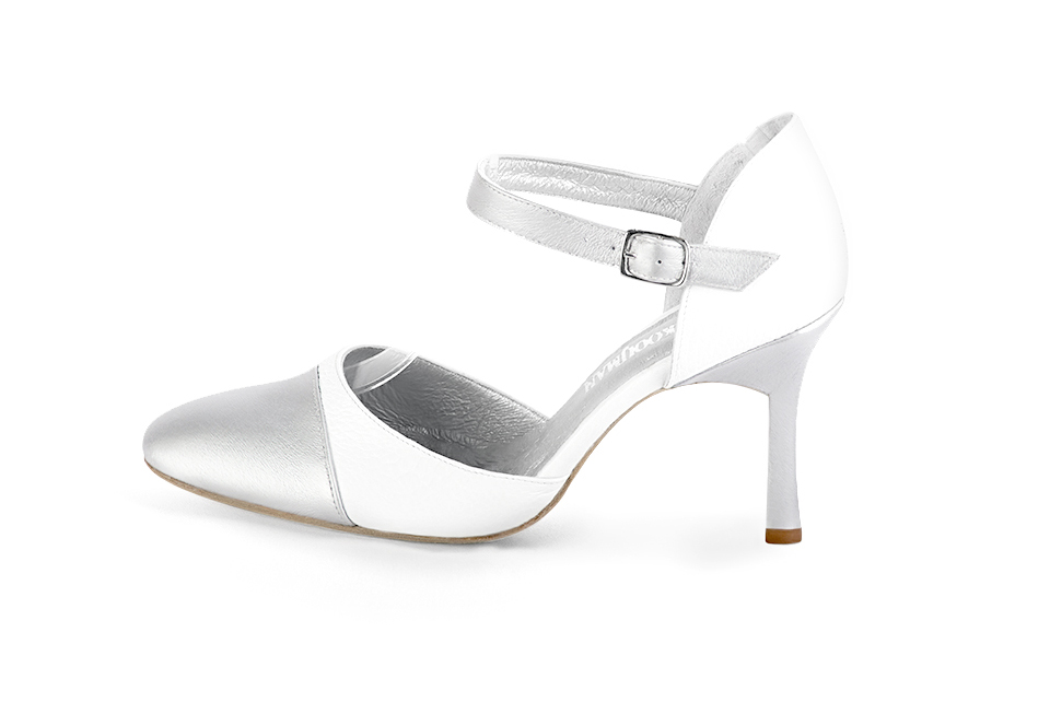 French elegance and refinement for these light silver and pure white dress open side shoes, with an instep strap, 
                available in many subtle leather and colour combinations. Its high vamp and fitted strap will give you good support.
To personalize or not, according to your inspiration and your needs.  
                Matching clutches for parties, ceremonies and weddings.   
                You can customize these shoes to perfectly match your tastes or needs, and have a unique model.  
                Choice of leathers, colours, knots and heels. 
                Wide range of materials and shades carefully chosen.  
                Rich collection of flat, low, mid and high heels.  
                Small and large shoe sizes - Florence KOOIJMAN